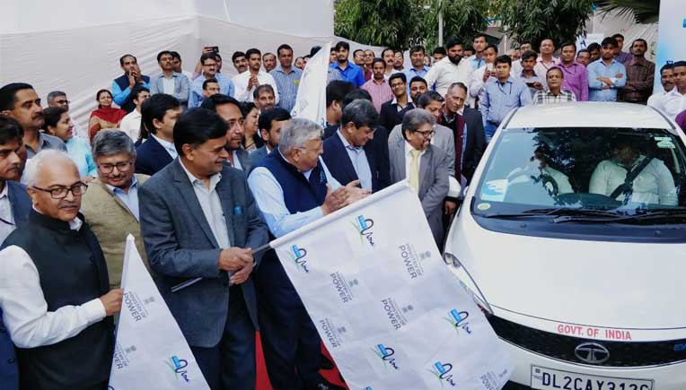 Minister of Power, New and Renewable Energy, R K Singh flagging off an electric vehicle