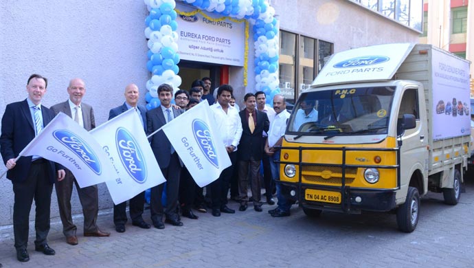 Ford officials flagging off the components