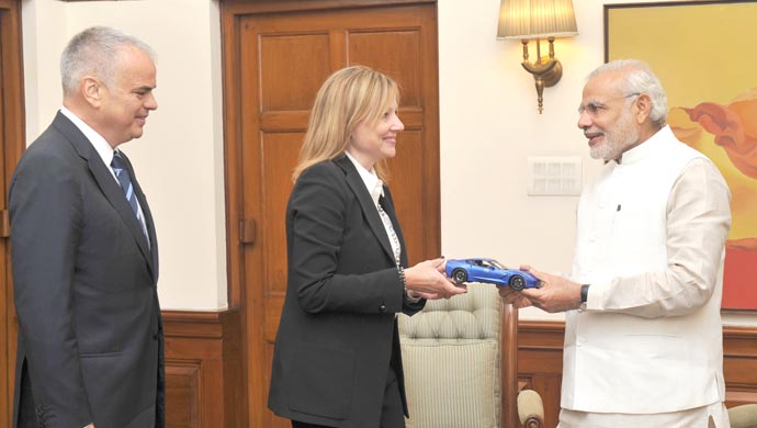 Mary Barra with Indian Prime Minister Narendra Modi. Also seen in the picture is Stefan Jacoby. Pic courtesy PIB