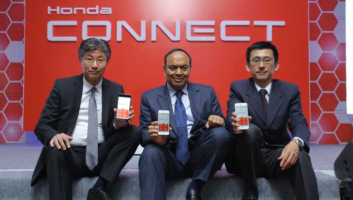 LtoR Katsushi Inoue, President & CEO, Honda Cars India Ltd. with  Nirmal Kumar Minda CEO UNO Minda and Masayuki Mukai CEO Honda Access India at the launch