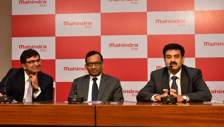 Dr Pawan Goenka, ED, M&M flanked by Rajesh Jejurikar, President & Chief Executive, FES and 2W and Vinod Sahay, CEO, 2W Division at a press conference in Mumbai