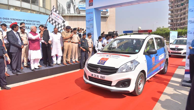 Haryana Chief Minister Manohar Lal and A K Tomer, Executive Director, Maruti Suzuki India Limited, flagging off 35 vehicles handed over by Maruti Suzuki India Limited under its CSR initiative