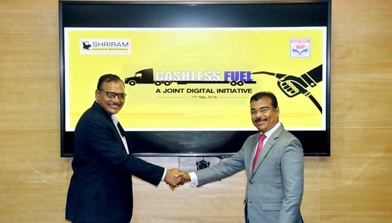 R To L-Umesh Revankar, MD & CEO, STFC and G S V Prasad, Executive Director-Retail, HPCL