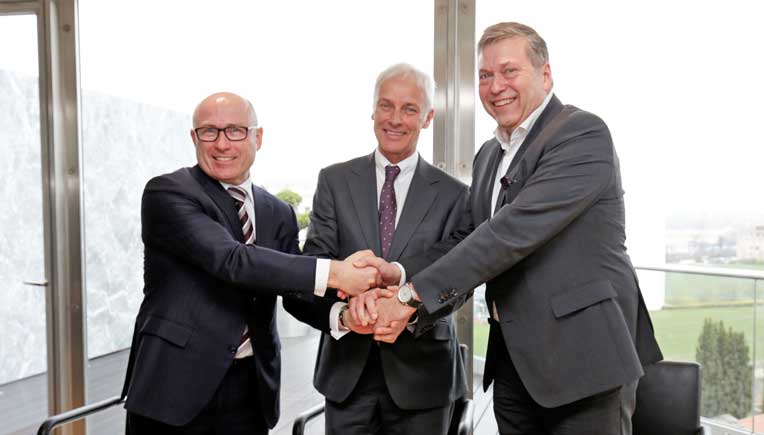 From L to R: Bernhard Maier, CEO of Skoda Auto, Matthias Muller, CEO of Volkswagen AG and Gunter Butschek, CEO & Managing Director of Tata Motors Ltd.