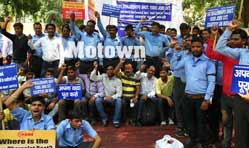 GM exit, a planned scam, say protesting GM India dealers