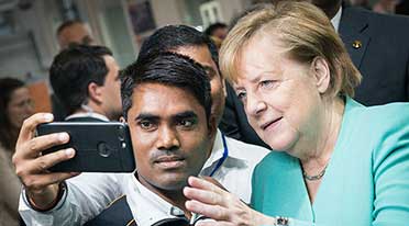Selfies, discussions for German Chancellor Dr. Angela Merkel at Continental office