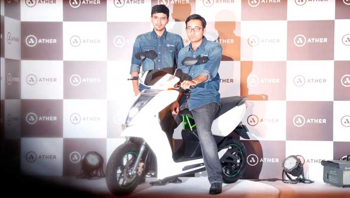The scooter and the co-founders of Ather Energy