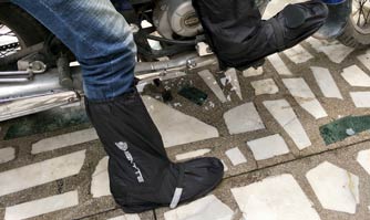 Ignyte shoe cover for riding two wheelers during rainy days