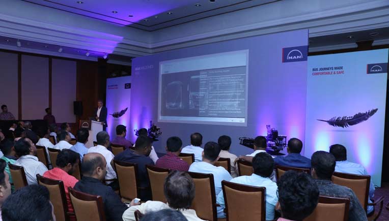Joerg Mommertz, Chairman & Managing Director, MAN Trucks India, addressing the customers during the launch event of the CLA BSIV bus chassis at Bengaluru