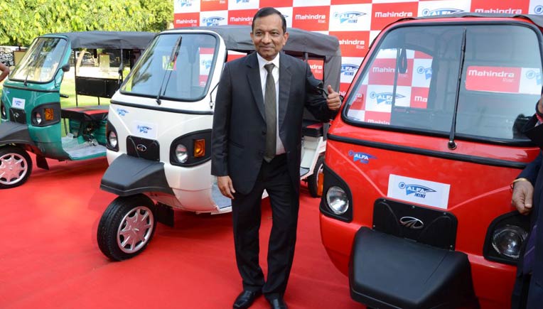 Dr Pawan Goenka with the new electric vehicle