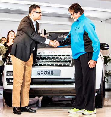 Rohit Suri,President, JLR India delivers the keys to the Range Rover to Amitabh Bachchan