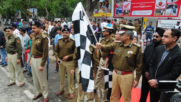 B.S. Bassi & Y.S. Guleria flagging off the Women Safety Rally on International Women's Day
