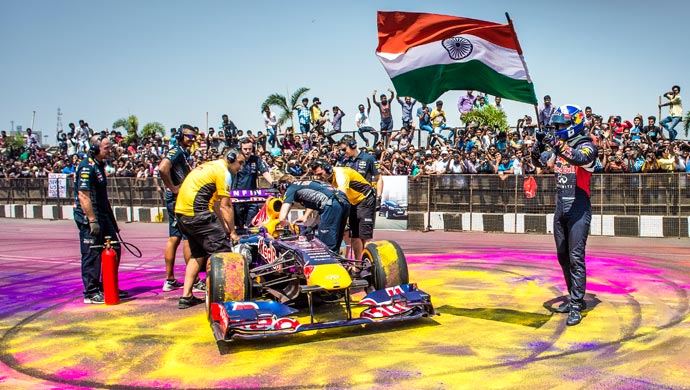 Legendary 13-time Grand Prix winner David Coulthard waiving the Indian flag