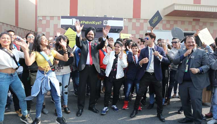 R. S. Kalsi, Sr. Executive Director, Marketing and Sales, Maruti Suzuki shaking a leg during the flash mob dance during the Auto Expo 2018