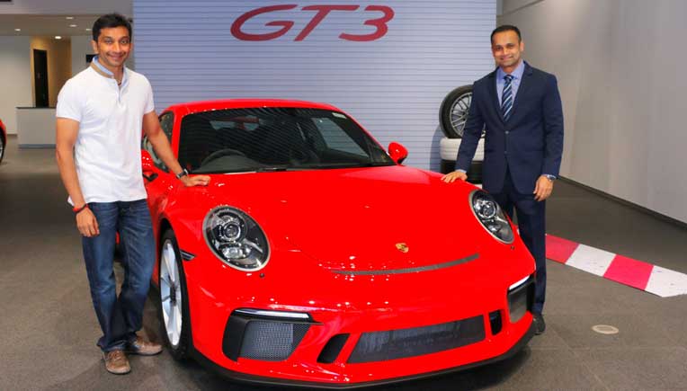 Narain with Pavan Shetty of Porsche