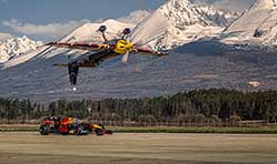 Red Bull Racing Honda F1 goes head to head with inverted plane 
