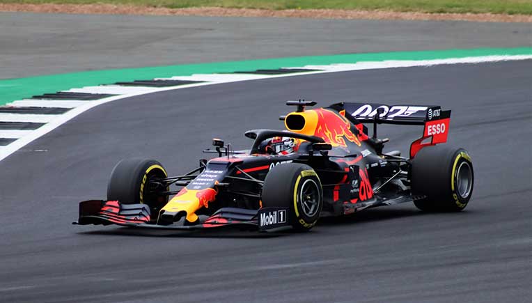 Max Verstappen racing his Red Bull at F1 British GP