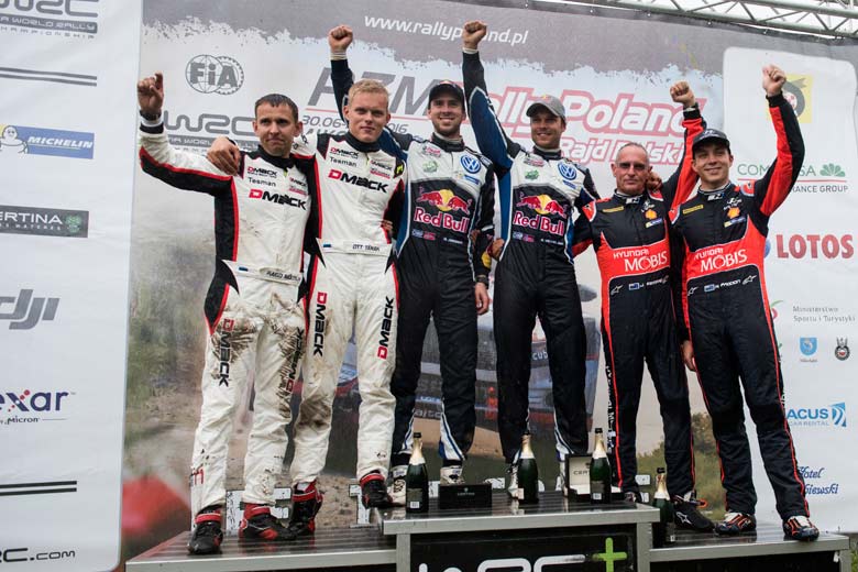 Ott Tanak (EST), Andreas Mikkelsen (NOR), Hayen Paddon (NZL) celebrate the podium during FIA World Rally Championship 2016 Poland in Mikolajki, Poland on July 3, 2016