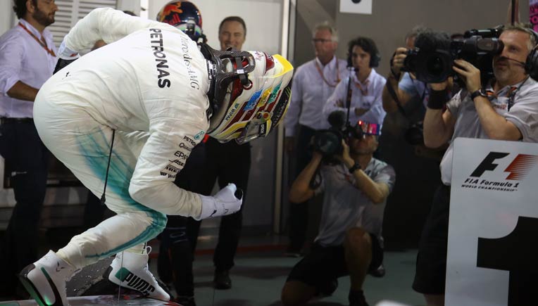 Lewis Hamilton after his win at the Singapore Grand Prix; Pictures courtesy Daimler