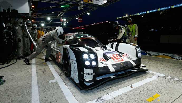 Porsche 919 Hybrid LMP1 car in the pits at the 24 Hours of Le Mans endurance race