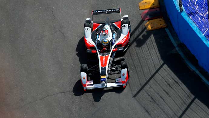 The Mahindra electric race car competing in a race; Picture courtesy FIA FormulaE
