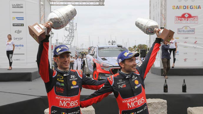 Belgian driver Thierry Neuville and his navigator with the winning trophy; Picture courtesy Hyundai
