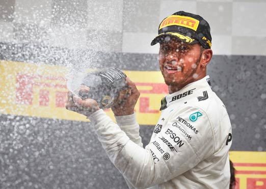 Hamilton holds off Vettel; Gets closer to F1 title
