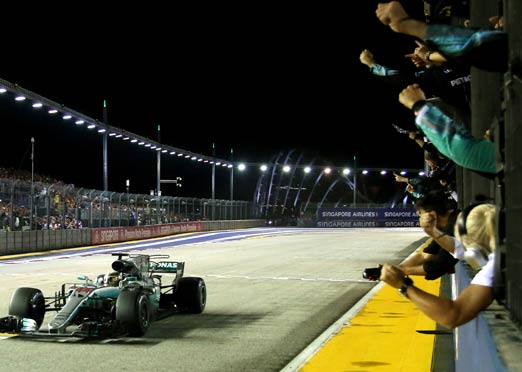 Hamilton wins Singapore Grand Prix; Ferrari drivers crash out