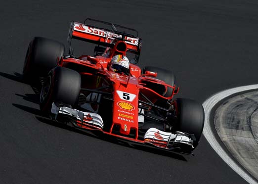 Sebastian Vettel wins Hungarian Gran Prix; Force India cars finish 8th & 9th