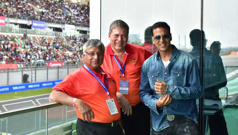Tata officials with Akshay Kumar, Indian film actor, during the race